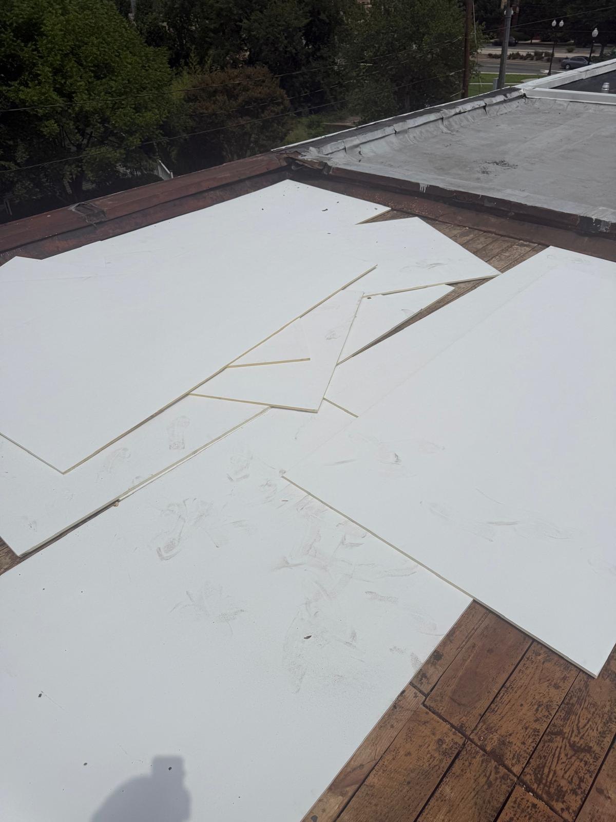 Roof boards fitted above the deck during installation.